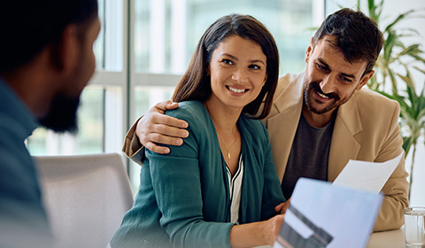 a couple getting advice from a financial expert