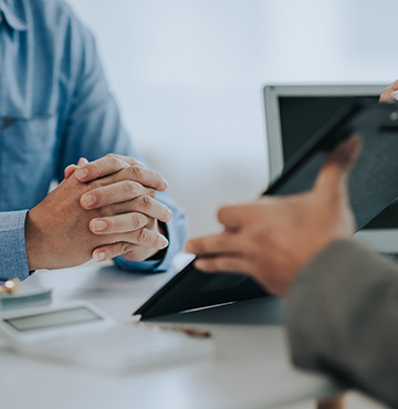 Finance consultant discussing possible finance solutions with client